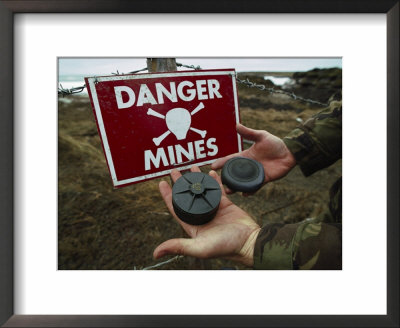 Deactivated Mines Held By A British Explosives Expert by Steve Raymer Pricing Limited Edition Print image