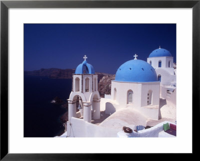 Blue Domed Churches, Oia, Santorini, Cyclades Islands, Greece by Steve Outram Pricing Limited Edition Print image