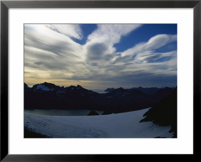 Clouds Blow Over Fortuna Bay At South Georgia Island by Maria Stenzel Pricing Limited Edition Print image