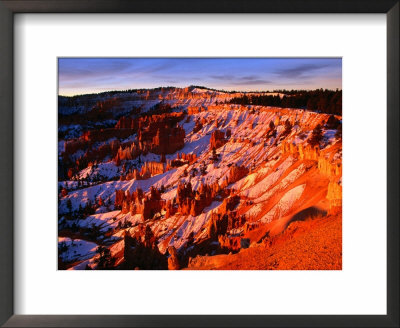 Sunset Over Canyon Slopes During Winter, Bryce Canyon National Park, Usa by Carol Polich Pricing Limited Edition Print image