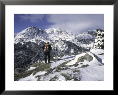 Hiker Enjoying The Winterlandscape Around Arapahoe Peak, Colorado by Michael Brown Pricing Limited Edition Print image