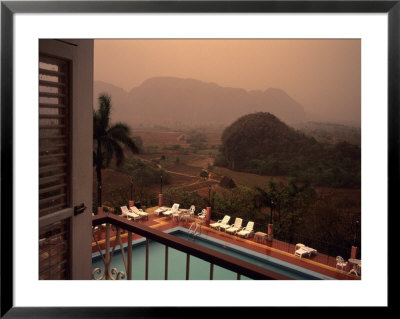 A Beautiful View From A Hotel Balcony During An Afternoon Rainshow, Vinales, Cuba by Taylor S. Kennedy Pricing Limited Edition Print image