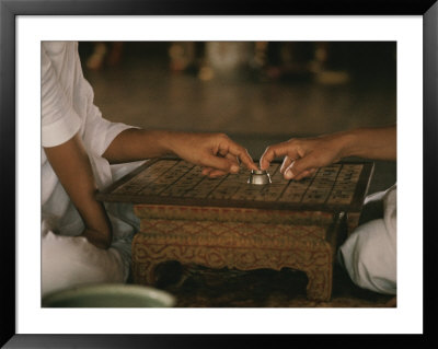 A Thai Fortune Teller Predicts The Future For A Client by W. E. Garrett Pricing Limited Edition Print image