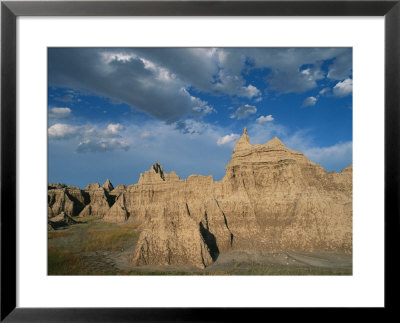 Sunset On The Pinnacle Formations Of The Badlands by Annie Griffiths Belt Pricing Limited Edition Print image