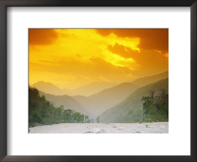 Sunset With Mountains And Trees Over The Karnali River In Nepal by Mark Cosslett Pricing Limited Edition Print image