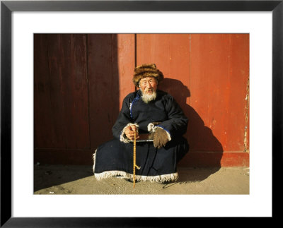 A Man Sits In The Sun In Ulaanbaatar, Mongolia by Ed George Pricing Limited Edition Print image
