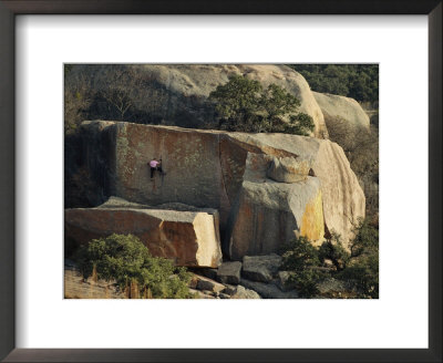 A Climber Scales A Lichen-Covered Rock by Stephen Sharnoff Pricing Limited Edition Print image