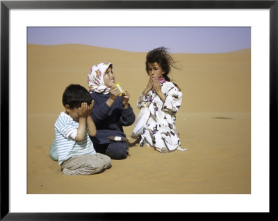 Children In Desert, Morocco by Michael Brown Pricing Limited Edition Print image