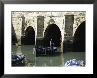 Man On Blue Boat, Morocco by Michael Brown Pricing Limited Edition Print image