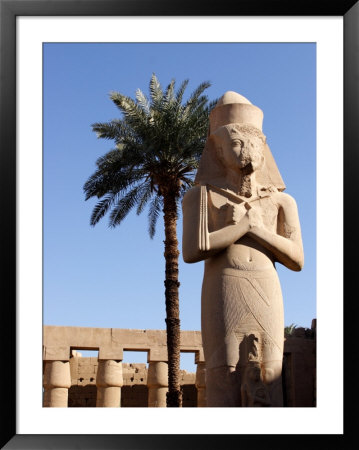 Ramses Ii Statue And Palm Tree At The Karnak Temple, Egypt by Michele Molinari Pricing Limited Edition Print image