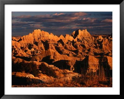 Cliff Shelf At Dusk, Badlands National Park, Usa by Carol Polich Pricing Limited Edition Print image