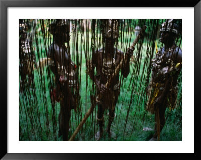 Men In Traditional Dress At Kamindimbit Village, Papua New Guinea by Jerry Galea Pricing Limited Edition Print image