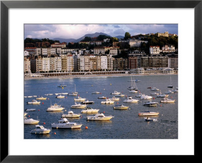 Boats And Waterfront Buildings At Playa De La Concha, San Sebastian, Spain by Dallas Stribley Pricing Limited Edition Print image
