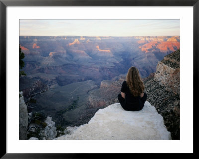 A Woman Looks Out Over The Spectacular Canyon Scenery by Al Petteway Pricing Limited Edition Print image