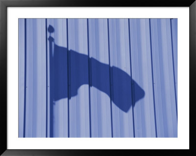 Waving Shadow Of The American Flag On A Corrugated Storage Building by Stephen St. John Pricing Limited Edition Print image