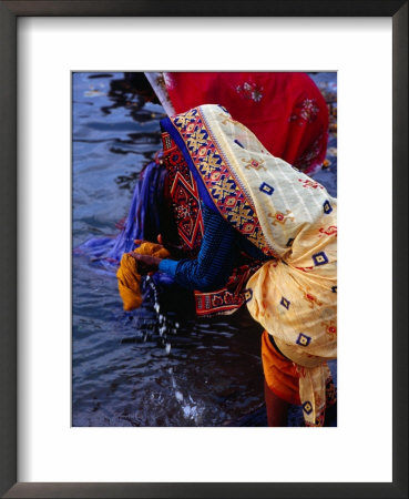 Women Washing Saris At Man Mandir Ghat, Varanasi, Uttar Pradesh, India by Richard I'anson Pricing Limited Edition Print image