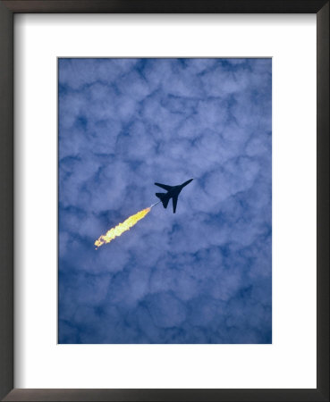 An Airforce Jet Leaves Behind A Trail Of Fire During The Air Display At The Australian Grand Prix by Phil Weymouth Pricing Limited Edition Print image