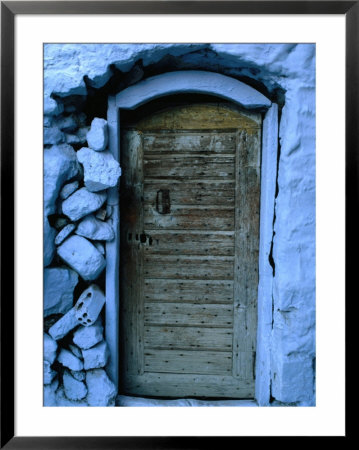 Wooden Door In Rubblestone Wall, Kalymnos, Greece by Jeffrey Becom Pricing Limited Edition Print image