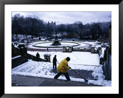 Sweeping Snow From Steps At Central Park In Winter, New York City, New York, Usa by Angus Oborn Pricing Limited Edition Print image