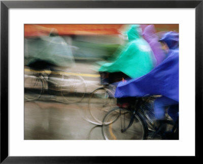 Bike Riders In Storm, Zhenjiang, China by Greg Elms Pricing Limited Edition Print image