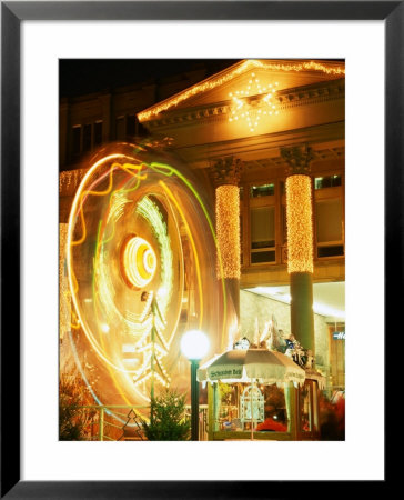 Lit-Up Facade Of Konigsbau And Ferris-Wheel During Christmas Market, Nuremberg, Germany by Martin Moos Pricing Limited Edition Print image