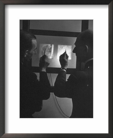 Fingerprint Experts Comparing A Scene Of Crime Print And A Print Of Same Finger by David Scherman Pricing Limited Edition Print image
