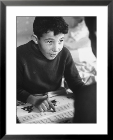 One Of The Rotolo Brothers Reading After Cataract Operations Which Restored Their Sight by Carlo Bavagnoli Pricing Limited Edition Print image