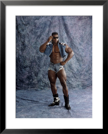 Muscular Man Wearing Tight Denim Shorts And Vest by Paul Thompson Pricing Limited Edition Print image