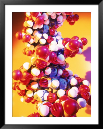 Blurred Image Of Model Of Dna With Yellow Background by Peter Gregoire Pricing Limited Edition Print image