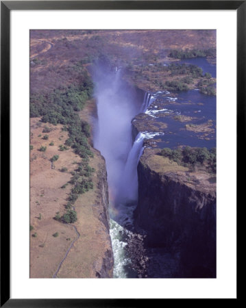 Victoria Falls In Zimbabwe by Frank Perkins Pricing Limited Edition Print image