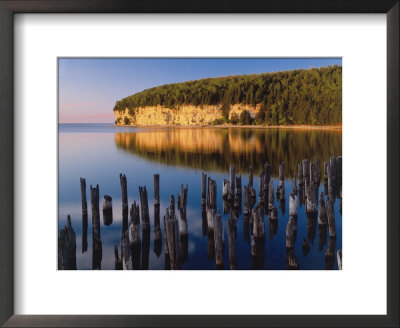 Sunset Light On The Cliffs On Big Bay De Noc At Fayette State Historic Park, Michigan, Usa by Willard Clay Pricing Limited Edition Print image