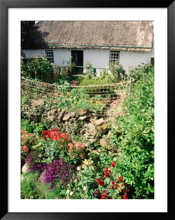 Thatched Roof Cottage, Co Donegal, Ireland by Kindra Clineff Pricing Limited Edition Print image