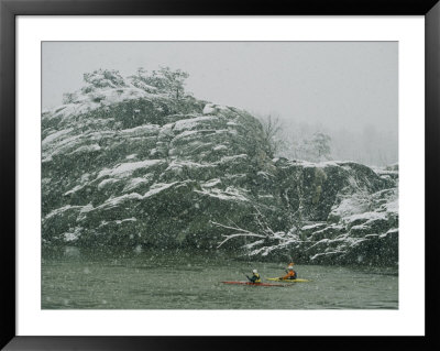 Kayakers Paddle On The Potomac River During A Spring Snowstorm by Skip Brown Pricing Limited Edition Print image