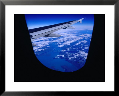 Aircraft Wing And Clouds Over Southern Patagonia, Chile by Richard I'anson Pricing Limited Edition Print image