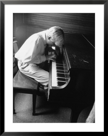Boy Playing The Piano by Rebecca Marvil Pricing Limited Edition Print image