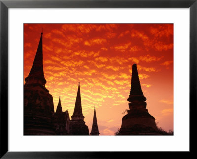 Sun Sets Over The Chedis (Buddhist Stupas) Of Wat Phra Si Sanphet, Ayuthaya, Thailand by Anders Blomqvist Pricing Limited Edition Print image