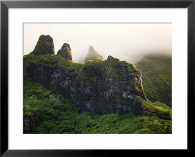 Clouds Around The Rugged Volcanic Peaks Of Moorea, French Polynesia by Tim Laman Pricing Limited Edition Print image