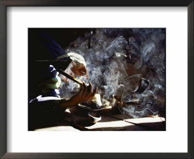 An Opium Addict Smokes Opium On Chinese Lunar New Year by Steve Raymer Pricing Limited Edition Print image