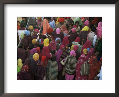 Women From Villages Crowd The Street At The Camel Fair, Pushkar, Rajasthan State, India by Jeremy Bright Pricing Limited Edition Print image