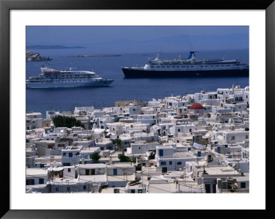 Cruise Ships Passing Houses Of Town, Mykonos Town, Greece by Wayne Walton Pricing Limited Edition Print image