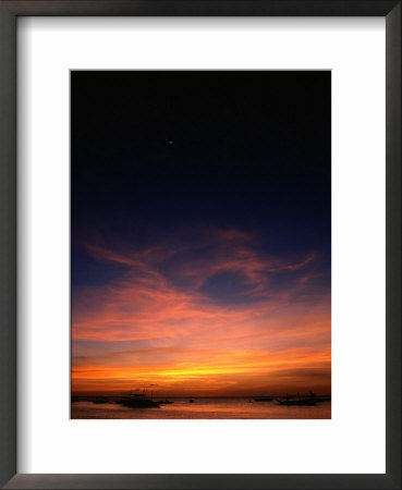 People And Boats Silhouetted At Sunset, White Beach, Philippines by Mark Daffey Pricing Limited Edition Print image