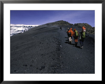Climbers Heading Up A Rocky Trail, Kilimanjaro by Michael Brown Pricing Limited Edition Print image