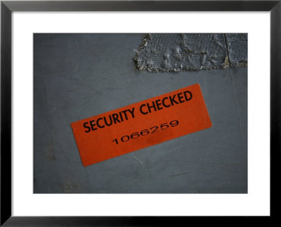 A Security Sticker Is Attached To A Piece Of Baggage by Stephen Alvarez Pricing Limited Edition Print image