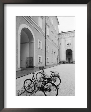 Bicycles In The Domplatz, Salzburg, Austria by Walter Bibikow Pricing Limited Edition Print image
