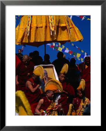 Tibetan Lamas Carrying Photo Of Dalai Lama During Tibetan New Years Festival, Nepal by Kraig Lieb Pricing Limited Edition Print image