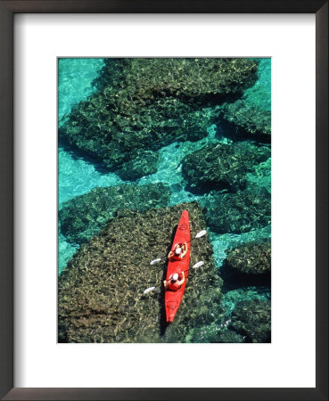 Kayakers Paddle On The Clear Waters Of The Gulf Of California by Ralph Lee Hopkins Pricing Limited Edition Print image
