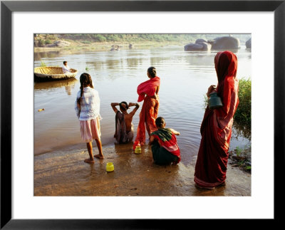 Females Washing In River In Morning, Hampi, Karnataka, India by Greg Elms Pricing Limited Edition Print image