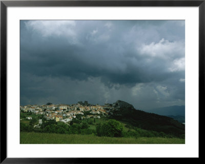 Dark, Cloud-Filled Sky Over Baranello And Surrounding Countryside by O. Louis Mazzatenta Pricing Limited Edition Print image