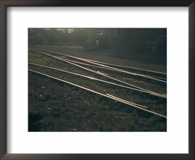 Morning Sun Highlights The Tracks Of This Railroad That Runs Through Santa Fe, New Mexico by Stacy Gold Pricing Limited Edition Print image
