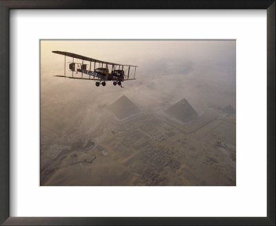 In The Light Of Early Morning, The Vimy Circles The Pyramids At Giza On A Dawn Tour, Egypt by James L. Stanfield Pricing Limited Edition Print image